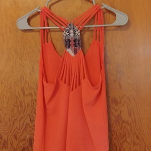 Strappy coral tank with back detail